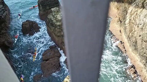 Kayak crossing between South Stack and Goleudy Ynys Lawd, North Wales