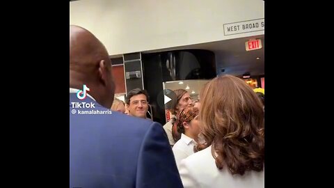 Kamala, using a fake accent, talks to a group of Black people about making collard greens.