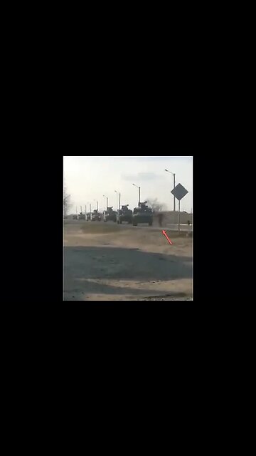 Ukrainian Man Tries to Block Russian Military Convoy