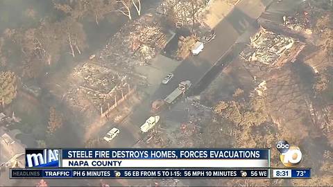 Steele fire destroys homes, forces evacuations