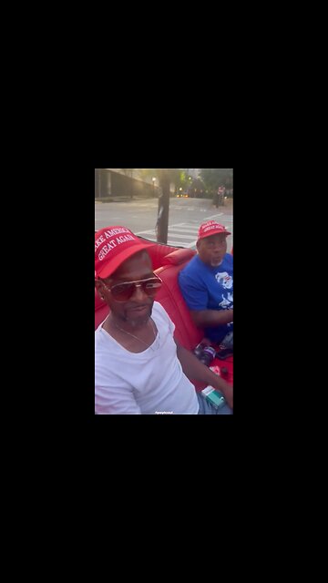 The Hood is behind President TRUMP.