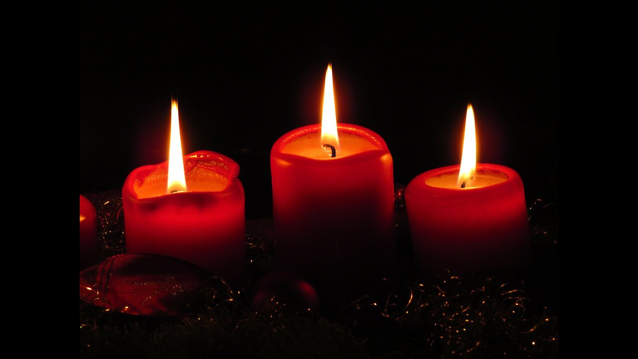 Three candles - a candle of Hope, Faith, and a candle of Love