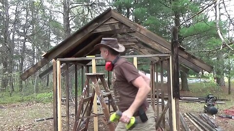 Building Chicken Coop While Melanie Sews With Cloth Scraps