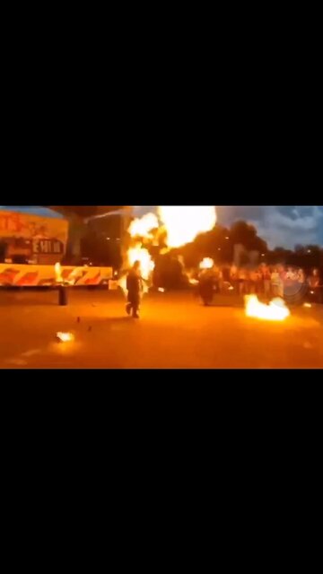 Lights herself on fire