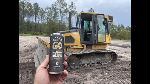 Bulldozer pushing mud