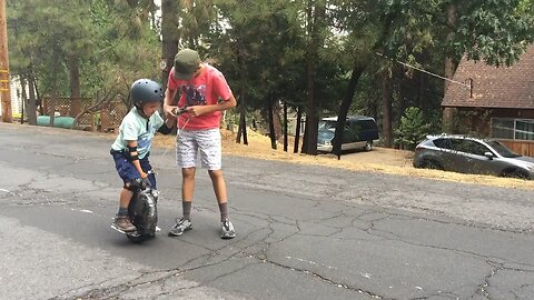 Casey learns electric unicycle