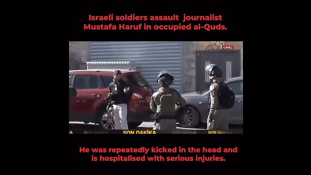 Israeli soldier assaulting journalists