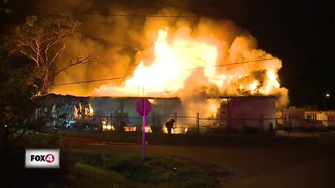 Firefighters battle warehouse fire in Fort Myers