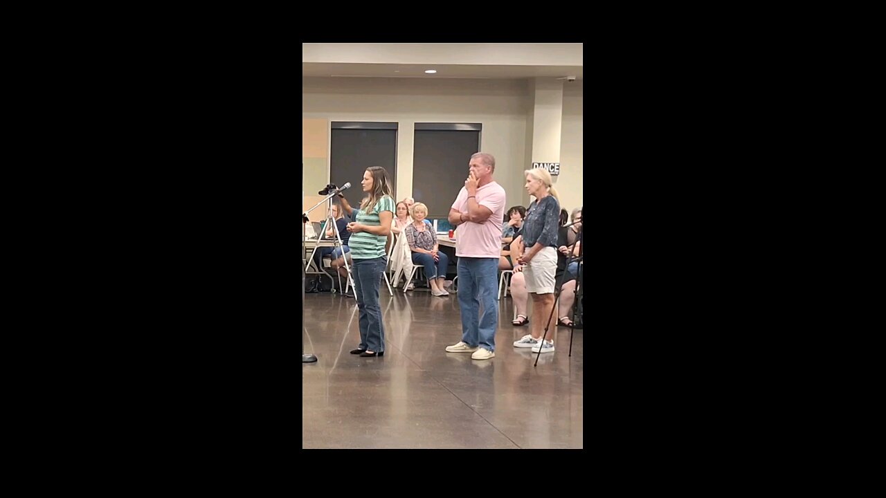 Jimmy Cavin assisting Celine county Republican committee member being harassed by woman in the back.