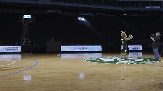 Bango nails half court shot at Science Day with TMJ4