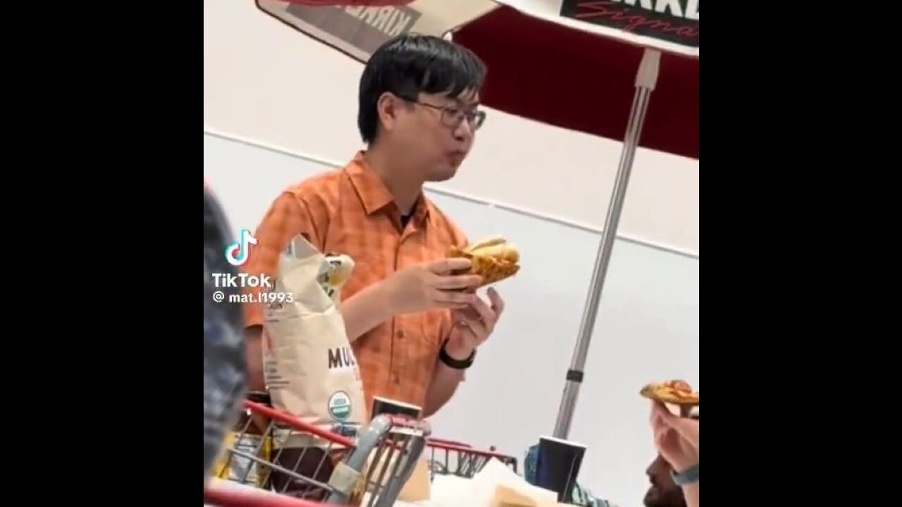 This Man Is My Hero: He Is Eating A Pizza-Wrapped Costco Hotdog