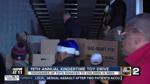 Officers and community organizations deliver toys to children