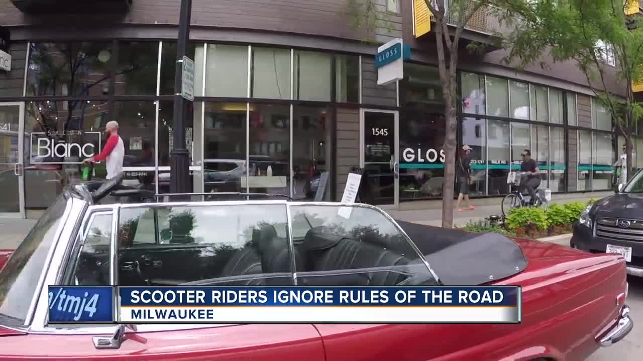 Scooter riders ignore the rules of the road