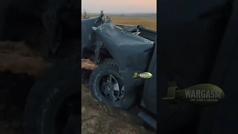 Totally totalled pickup with a torn ass