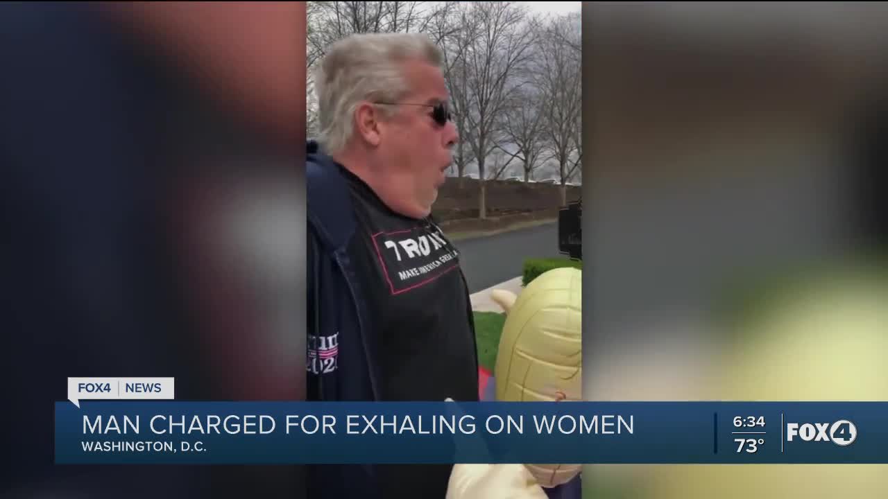 Man charged for exhaling on woman