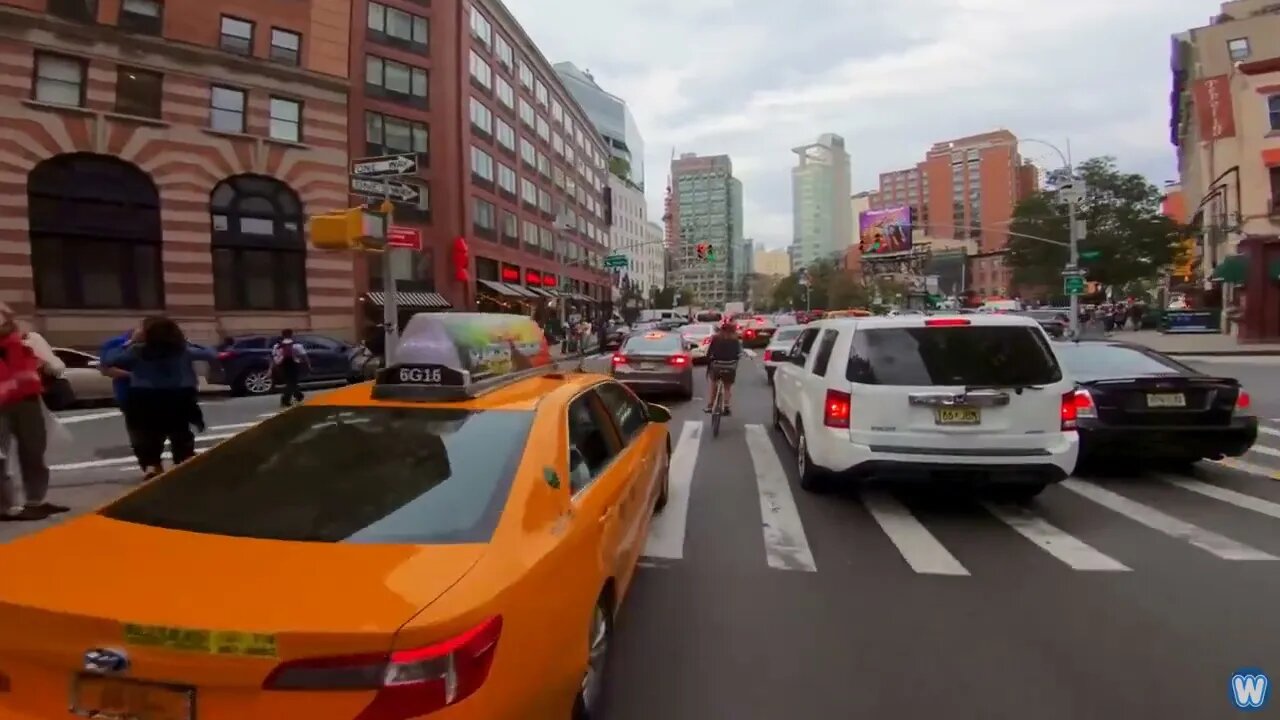 Bike Messenger Riding Fast and Fluid Through NYC Traffic