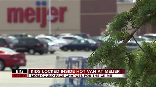 Police: Mother arrested for leaving kids in hot van in Clinton Township Meijer parking lot