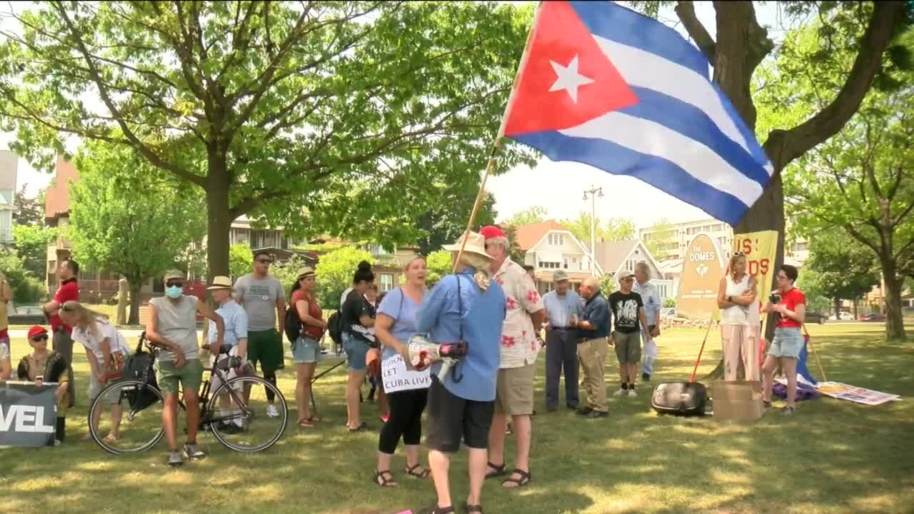 Demonstrators rally at Mitchell Park demanding an end of the Cuban embargo