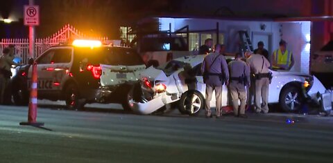 Car crashes into LVMPD vehicle
