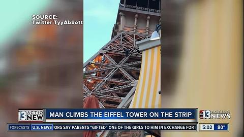 Man climbs the Eiffel Tower on the Strip