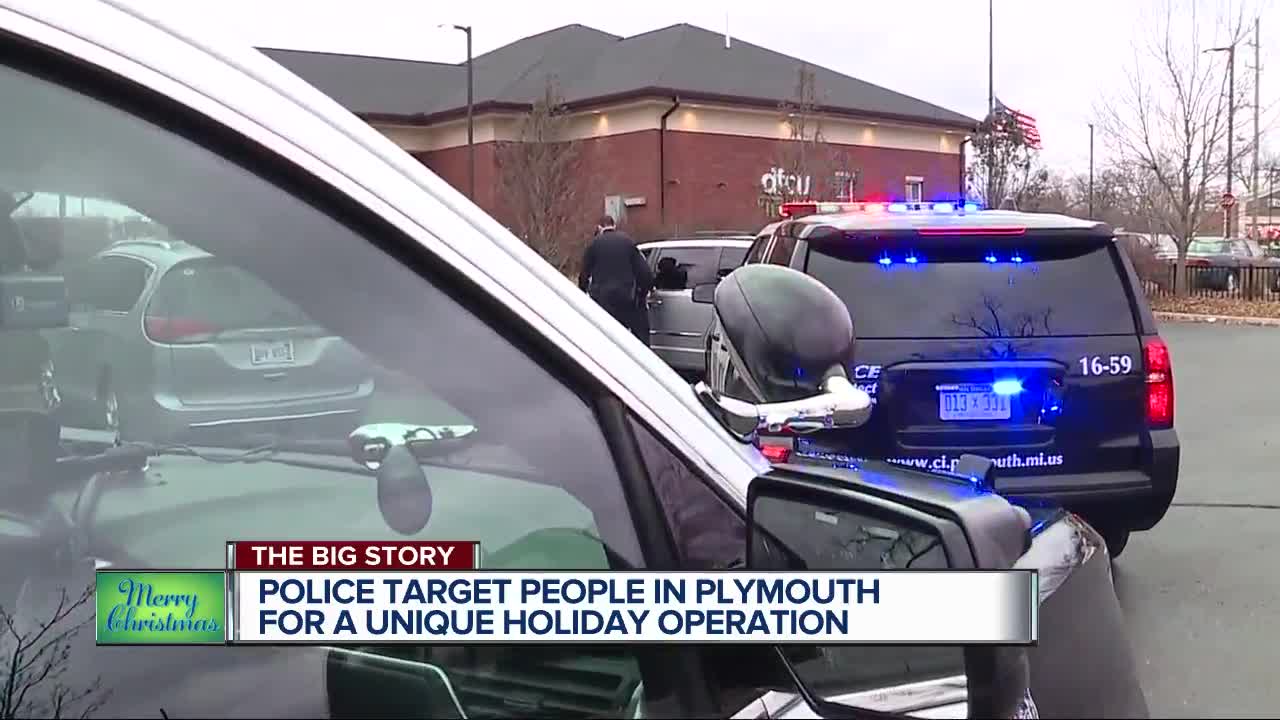 Police surprise people in Plymouth by stopping them to hand out gifts