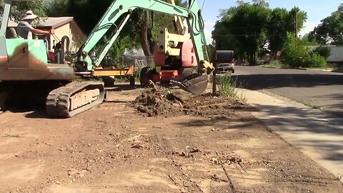 Yanmar YB 451 Excavator Grading A Yard