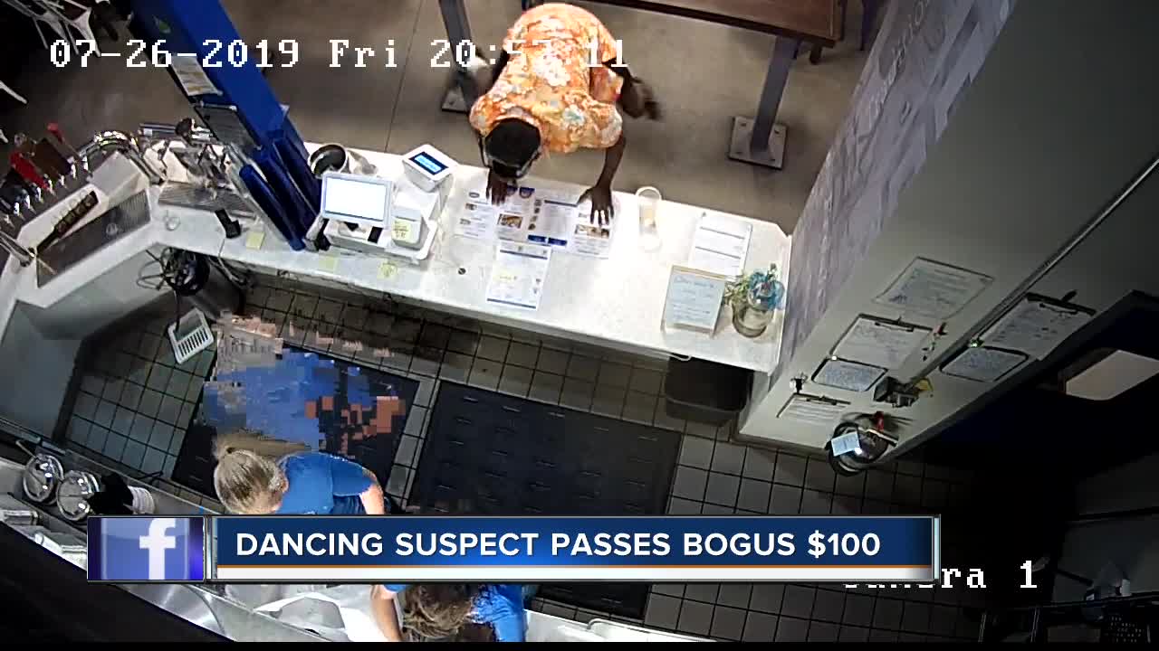 Dancing suspect passes fake $100 bill