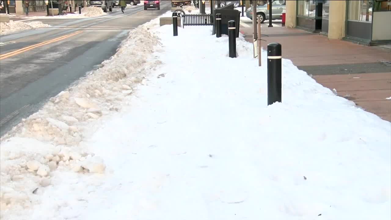 Snow leads to parking problems for Allen St. businesses under new parking design