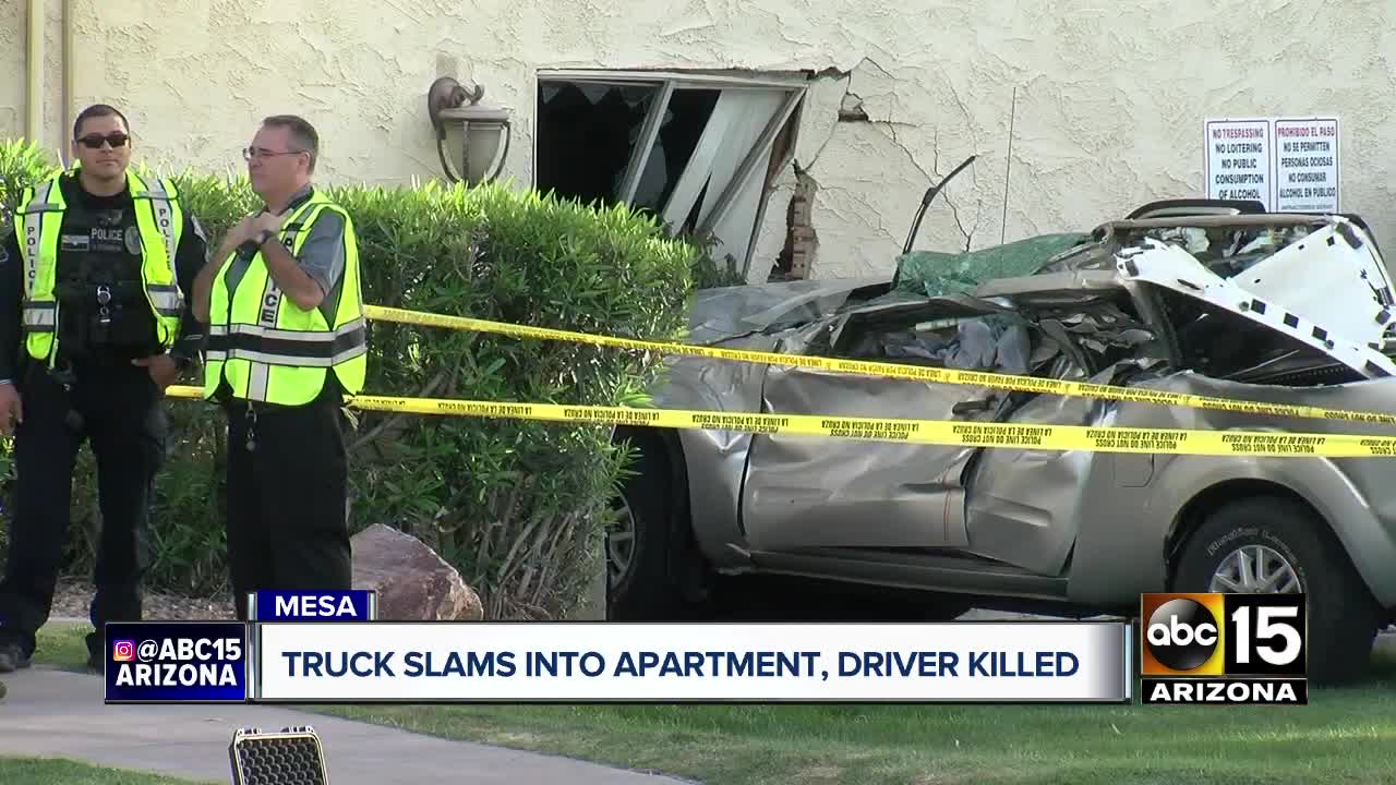 Truck slams into apartment, driver killed