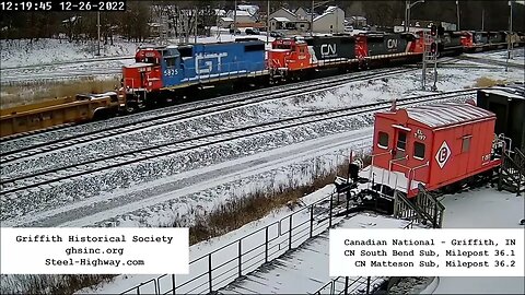 WB Manifest with IC, BCOL, UP, CN and GTW Power at Griffith, IN on December 26, 2022