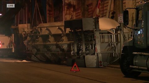 Crews clean up overturned semi-truck near Michigan Avenue Bridge