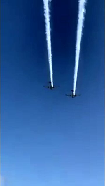 What The Hell Are These Planes Spraying Over This Beach Crowd?