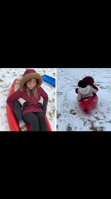 Kids on sled get airborne after hitting bump at fast speed