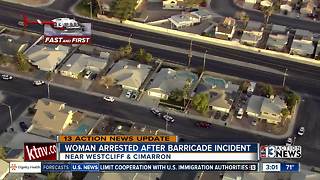 Woman arrested after barricade situation