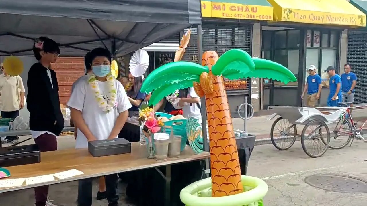 Community event taking place on Dorchester Ave near Adams Street