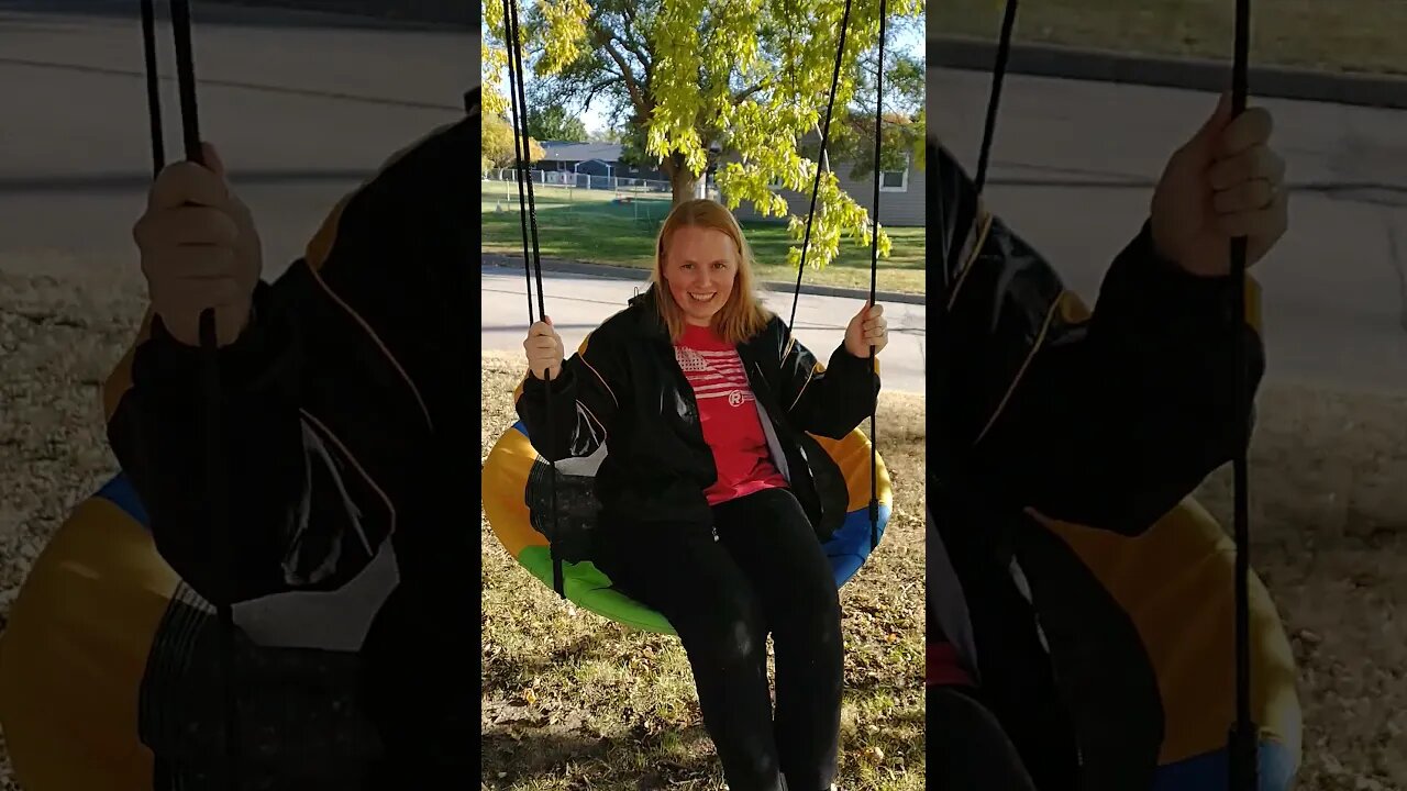 Midwest farmers daughter enjoys the swing