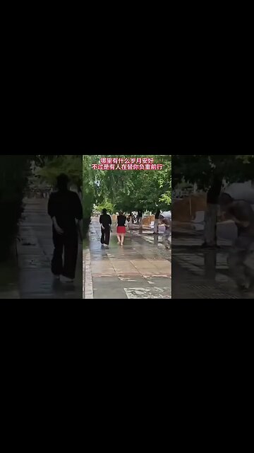 PLA Soldiers Pretend to Fight the Floods