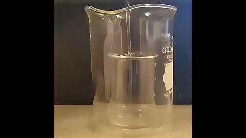 Watch a beaker disappear in oil! Same refractive index as borosilicate glass makes it invisible.