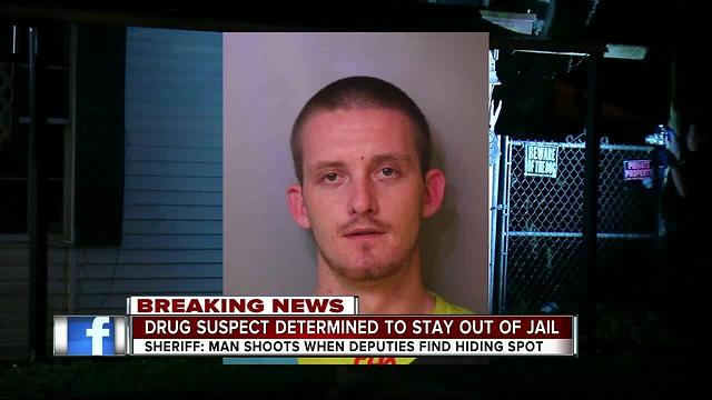 Barricaded suspect hiding in false wall dies after shootout with Polk deputies