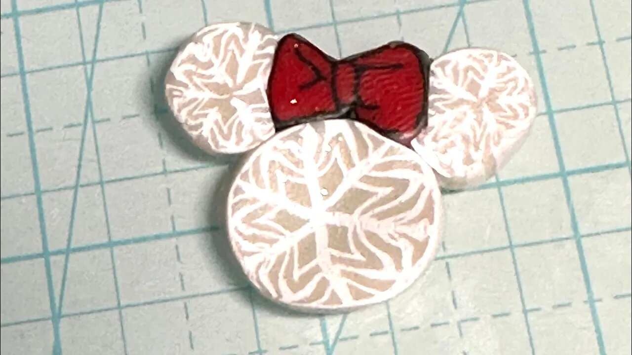 Red “Minnie” bow clay cane @Artwork By Colleen