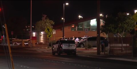Las Vegas police say 2 people injured, 1 dead in shootout