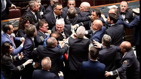 Moment enormous brawl breaks out in Italian parliament with MP 'leaving in a wheelchair'