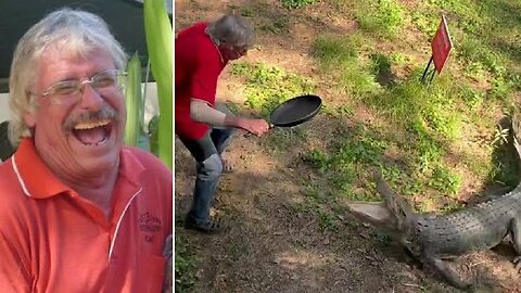 Man fights off the crocodile with frying pan