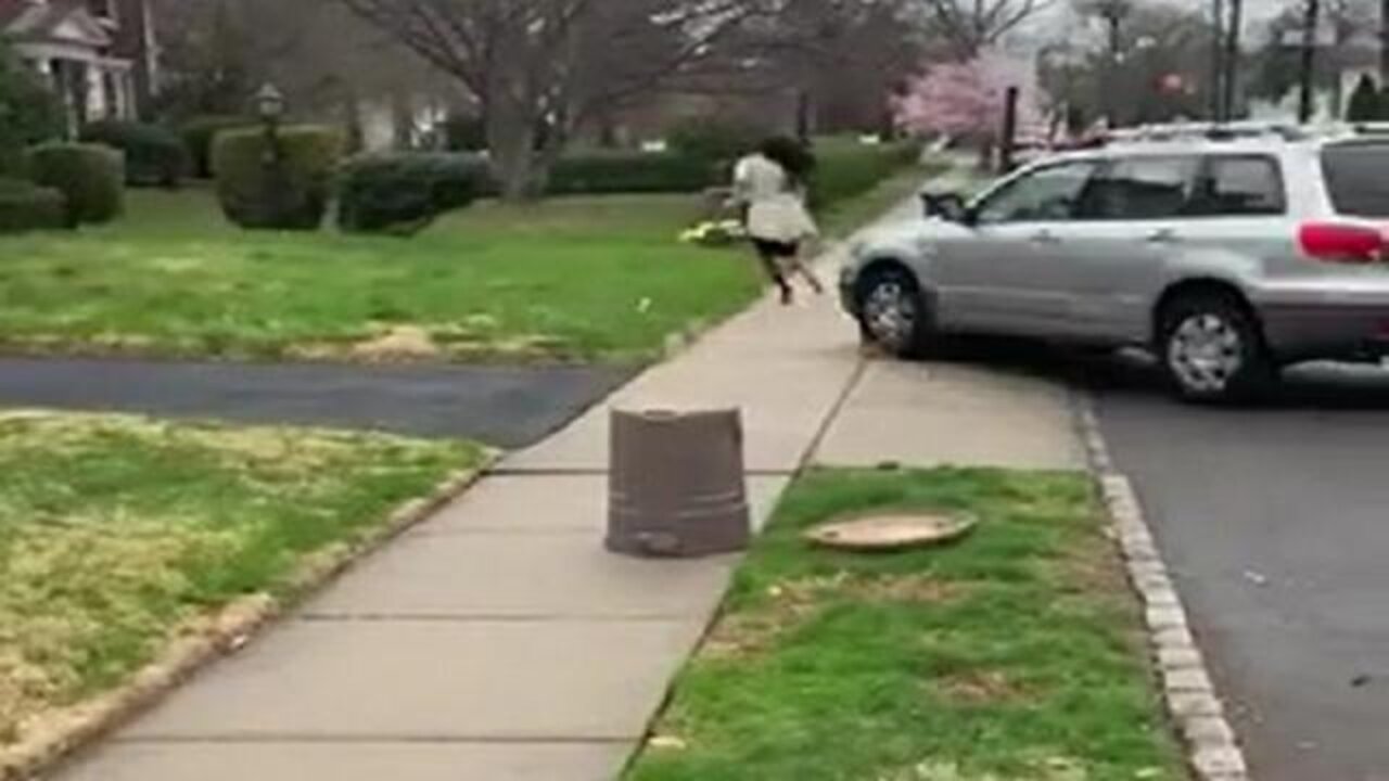 DISTURBING VIDEO ROAD RAGING DRIVER RUN WOMAN OVER ON NJ LAWN.