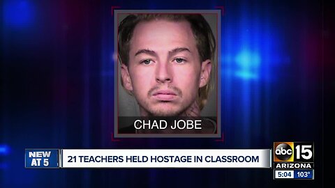 Man runs into Phoenix school, takes room full of teachers hostage