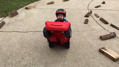 Terrified Toddler Pulls Off Epic Wheelie