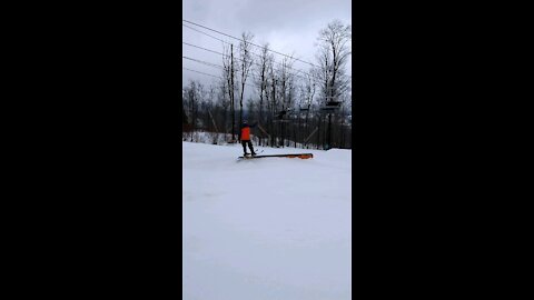 Bro hits some rails on skis