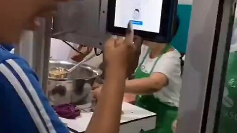 Children paying for lunches by facial recognition in China