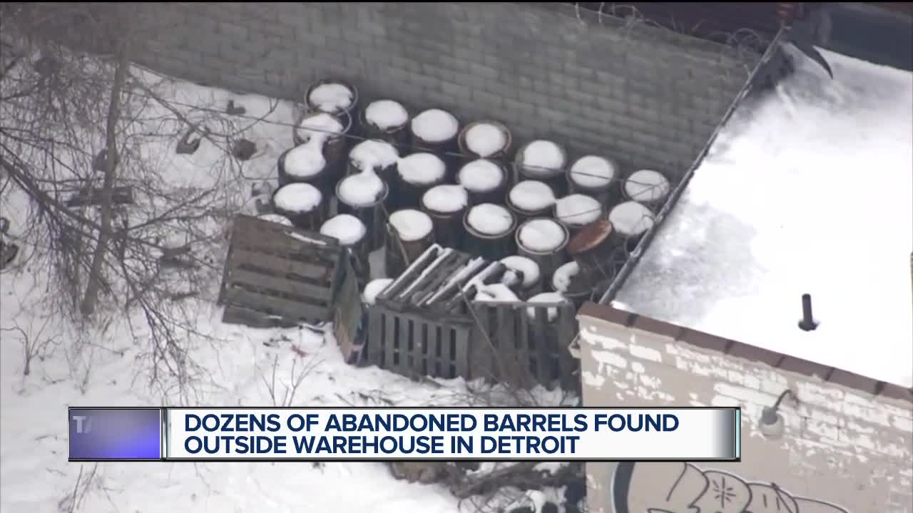 Fire marshal investigating unidentified barrels found behind building in northeast Detroit