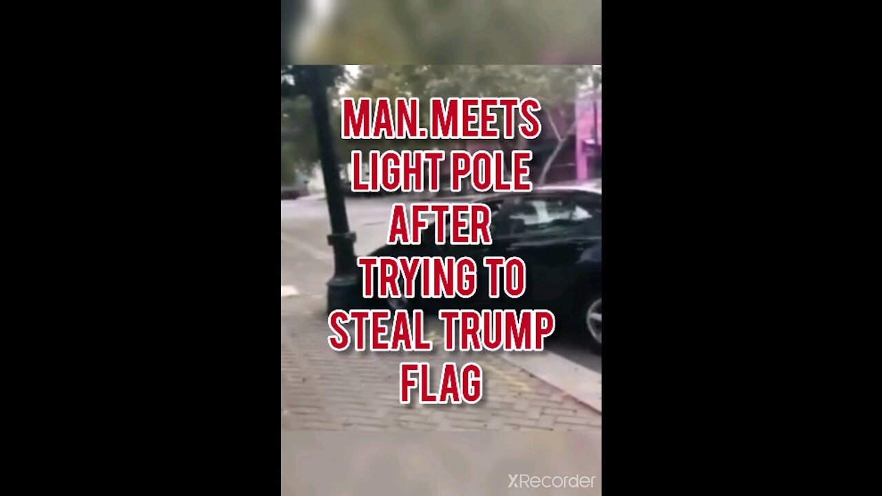 MAN MEETS LIGHT POLE AFRER TRYING TO STEAL TRUMP FLAG